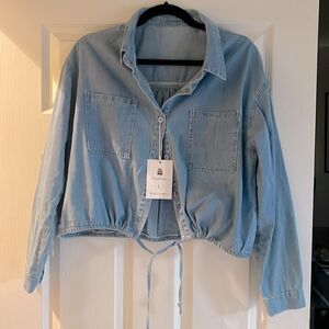 Large, long, sleeved, jean like shirt